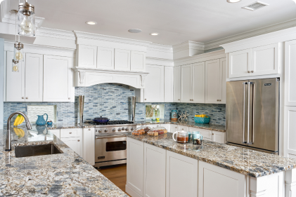 PRE ASSEMBLED A customer kitchen featuring white kitchen cabinets